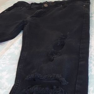 Copper rivet ripped jeans